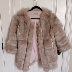 Women’s light pink faux fur coat